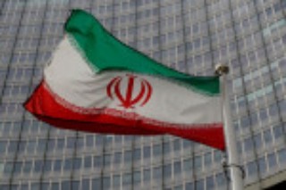 Iran says U.S. to lift oil sanctions, Germany cautious on matter