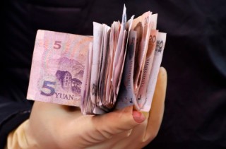 China forex regulator warns against illegal money outflows