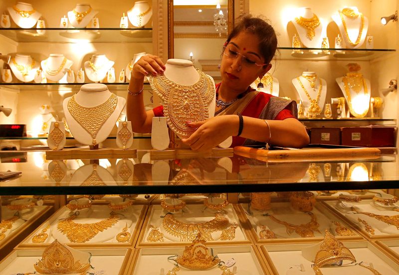 Gold bounces as dollar retreats post U.S. inflation data