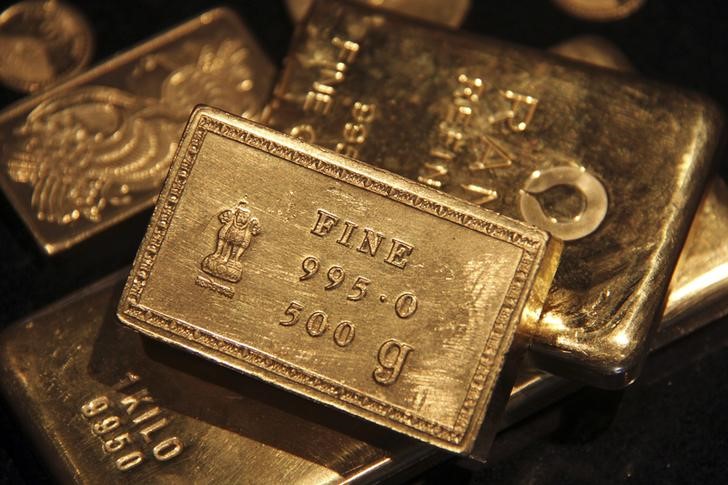 Gold Ticks Down After Dollar’s Brush With New 2-Decade High