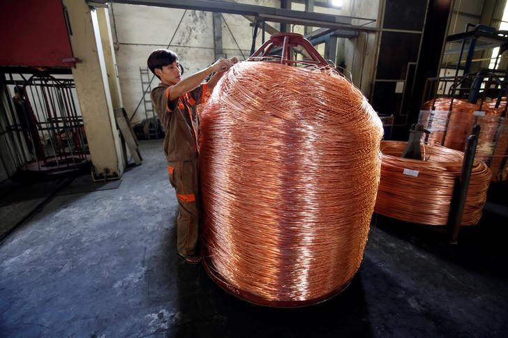 Gold Trades Flat, Copper Rises on China Stimulus Hopes