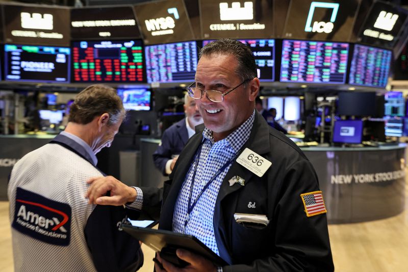 Wall St slips as weekly jobless claims edge lower