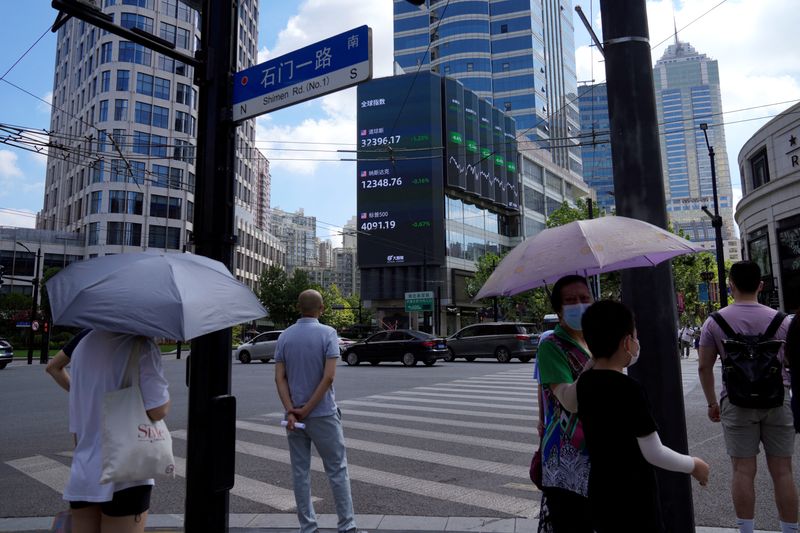 Asian markets gain, investors anxious for U.S. rate hike clues