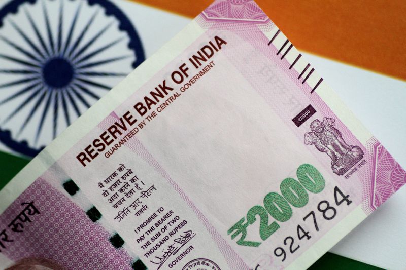 Indian govt not averse to weaker rupee vs dollar - source