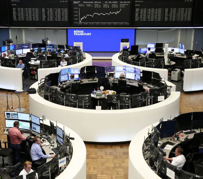 European shares slide to over 1-1/2 year lows on slowdown fears