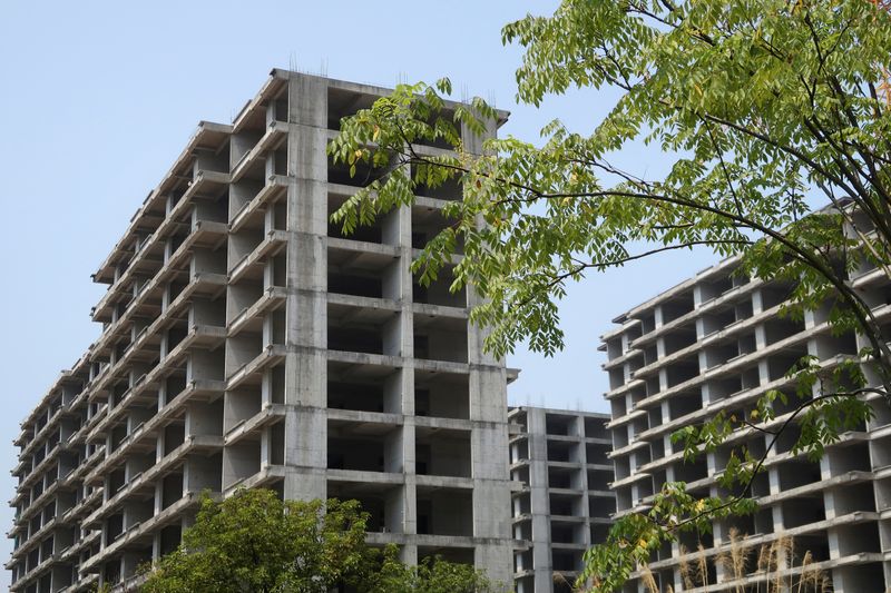 China to cut provident fund loan interest rate for first-time home buyers