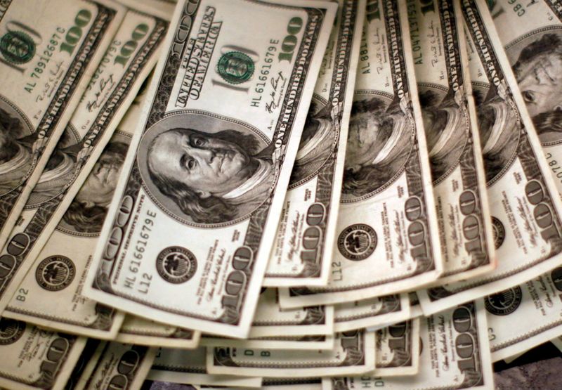 Dollar catches breath as traders await Powell testimony