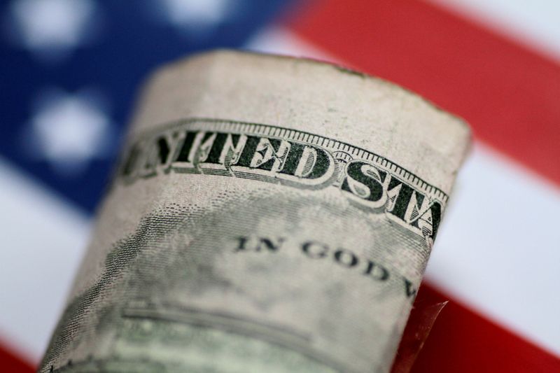 Dollar dips ahead of U.S. inflation data