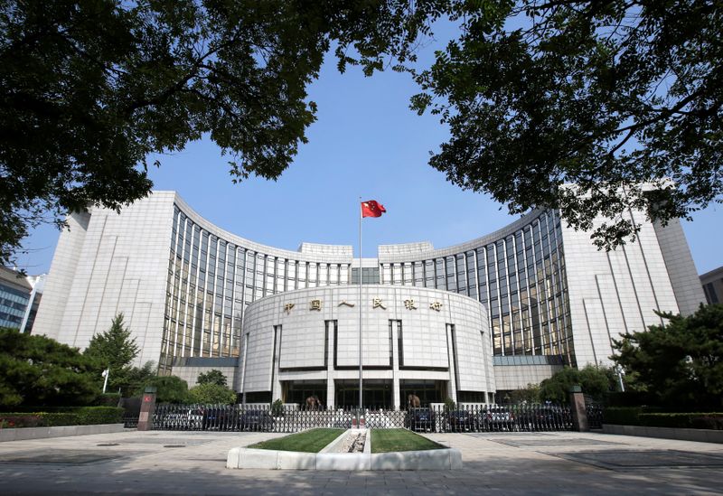 China central bank vows to push real lending rates lower